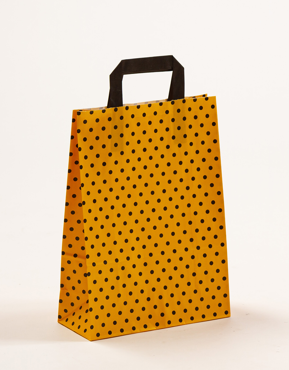 Produktbild Papiertragetaschen mit Flachhenkel gelb mit schwarzen Punkten in der Größe 22 x 10 x 31 cm