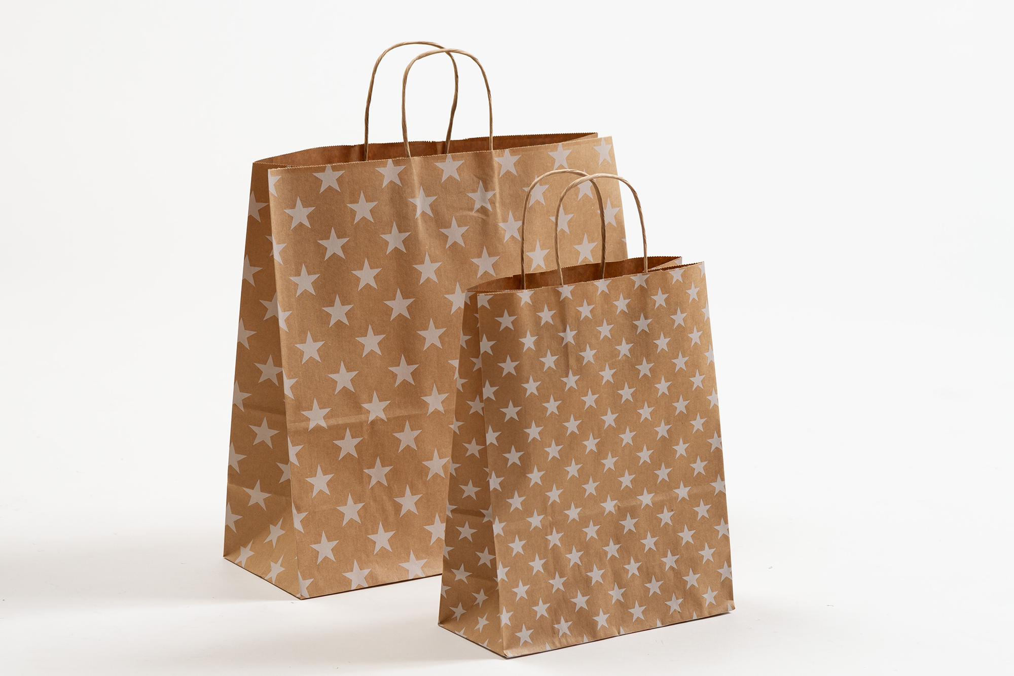 Gruppenbild SALE Papiertragetaschen mit gedrehter Papierkordel Sterne weiß