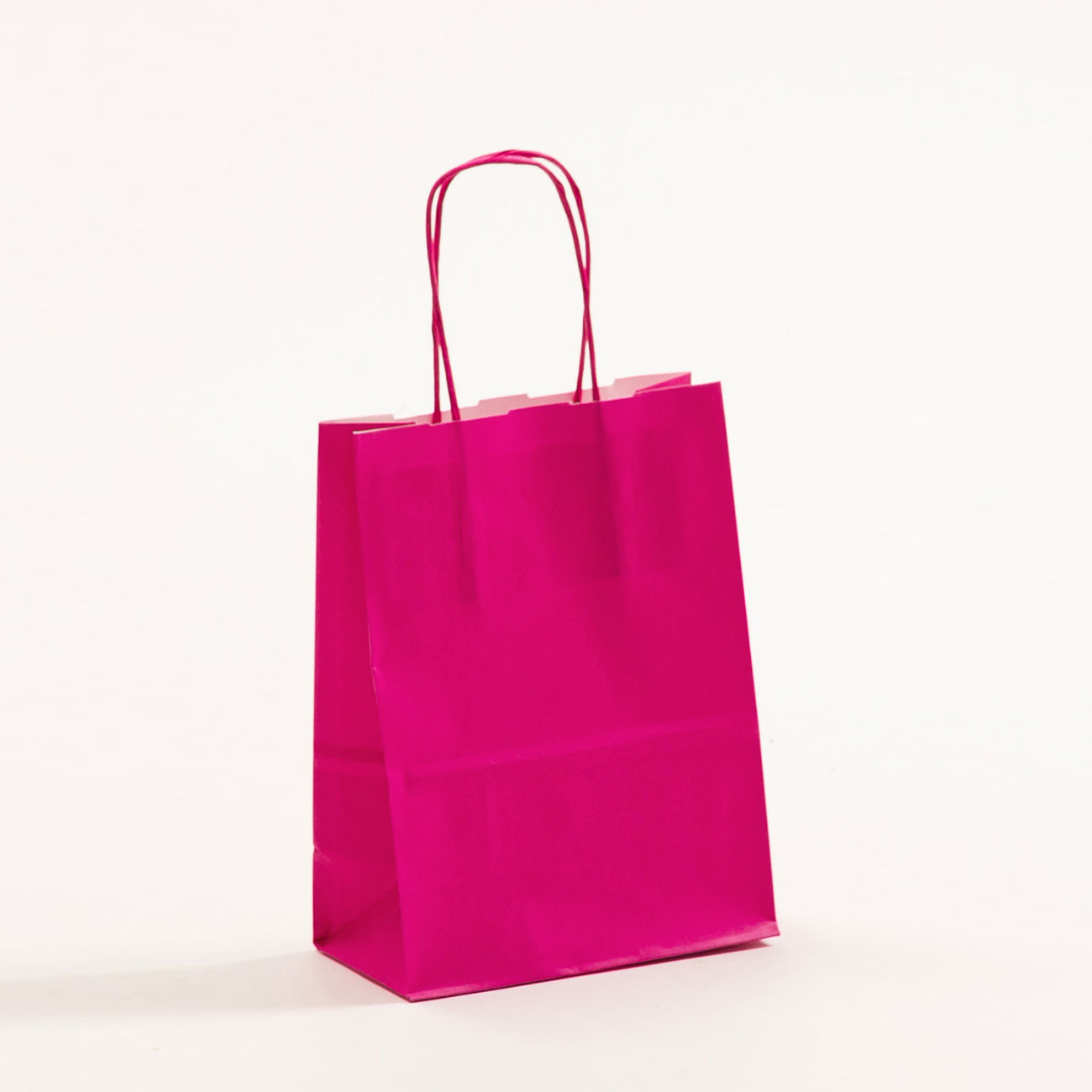 Produktbild Papiertragetaschen COLOR mit gedrehter Papierkordel pink in der Größe 15 x 8 x 20 cm